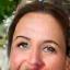 Profile image of Susan Davis, a woman in her late 40s smiling.